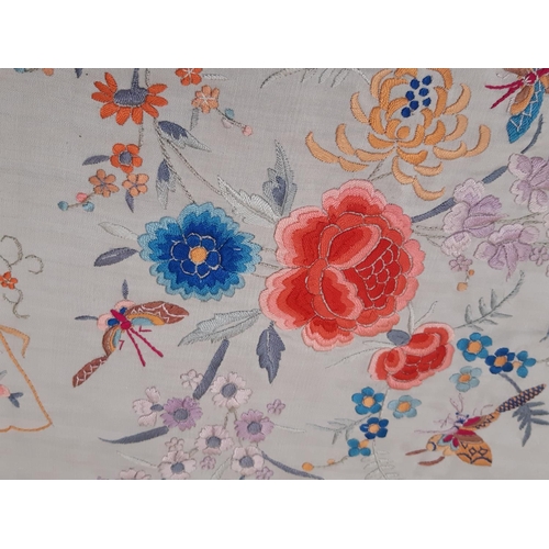 909 - Early 20th century 'Piano' shawl with colourful embroidered flowers and moths on ivory silk ground w... 