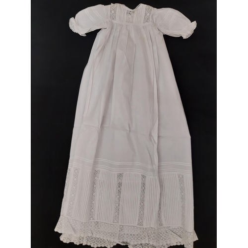 911 - Four early 20th century baby gowns  with lace, broderie anglaise and pin tuck detail, together with ... 