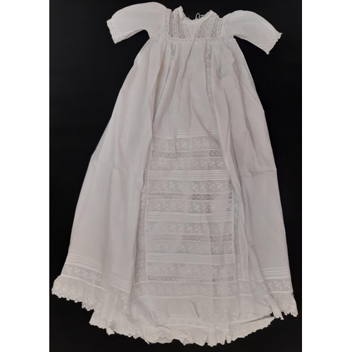 911 - Four early 20th century baby gowns  with lace, broderie anglaise and pin tuck detail, together with ... 