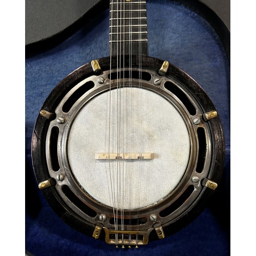 641A - A mandolin/miniature eight string banjo, in a hard carry case