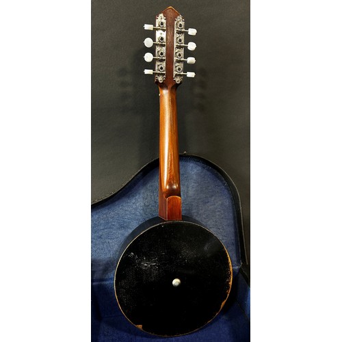 641A - A mandolin/miniature eight string banjo, in a hard carry case