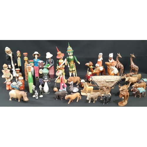 923 - A collection of vintage wooden dolls and carved animals, from Myanmar, Thailand, Europe and and Afri... 