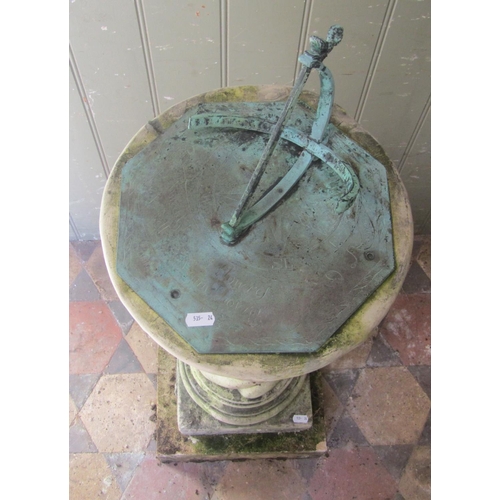 1047 - A  two sectional weathered cast composition stone garden sundial, the octagonal verdigris dial set o... 