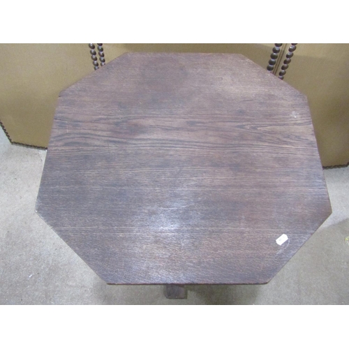 1139 - A sturdy Art Deco style oak occasional table, the octagonal top raised on boarded vertical slatted s... 