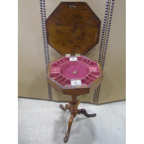 1144 - A Victorian walnut trumpet sewing table/work box, the hinged octagonal lid with inlaid floral detail... 