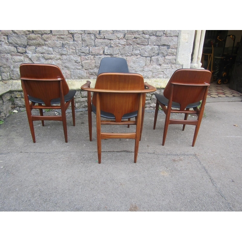 1151 - Mid 20th century teak extending table and four matchings chairs by Elliotts of Newbury, the table wi... 