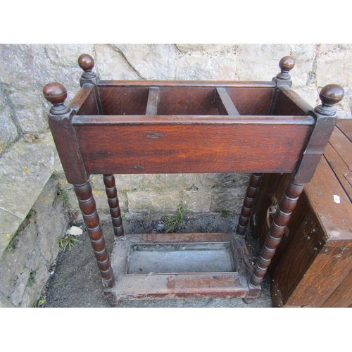 1156 - A Arts and Crafts oak coal/log box overlaid with copper fittings together with a oak stick stand, oa... 