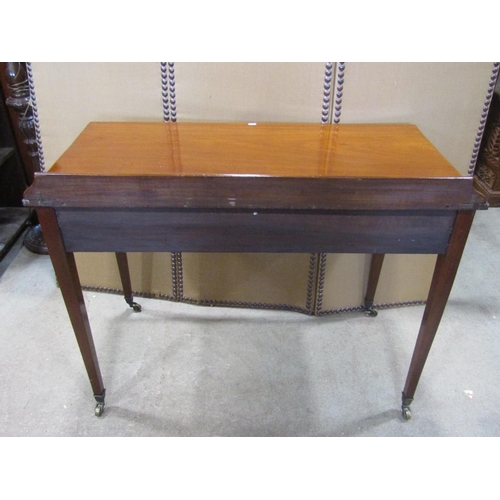 1176 - A 19h century mahogany side table with two frieze drawers on square tapered legs with brass cup cast... 