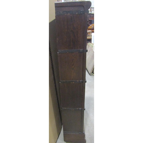 1179 - A Globe Wernicke & Co Ltd oak floorstanding four sectional library  bookcase with up and over rectan... 