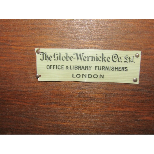 1179 - A Globe Wernicke & Co Ltd oak floorstanding four sectional library  bookcase with up and over rectan... 