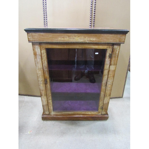 A Victorian walnut pier Cabinet with inlaid detail  enclosed by a rectangular glazed panelled door set on a moulded plinth, 100 cm high x 80 cm wide x 36 cm deep