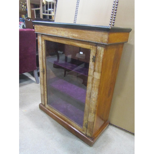 1187 - A Victorian walnut pier Cabinet with inlaid detail  enclosed by a rectangular glazed panelled door s... 