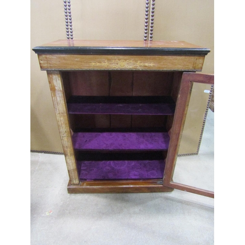 1187 - A Victorian walnut pier Cabinet with inlaid detail  enclosed by a rectangular glazed panelled door s... 