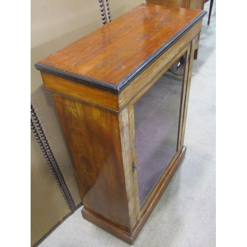 1187 - A Victorian walnut pier Cabinet with inlaid detail  enclosed by a rectangular glazed panelled door s... 