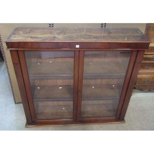 1231 - A Victorian mahogany bookcase enclosed by a pair of rectangular glazed panelled doors 112 cm high x ... 