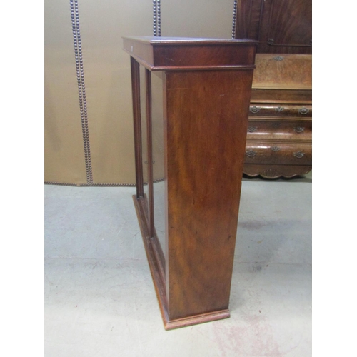 1231 - A Victorian mahogany bookcase enclosed by a pair of rectangular glazed panelled doors 112 cm high x ... 