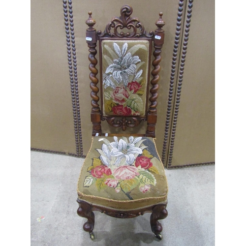 1247 - Victorian nursing chair with floral tapestry upholstered seat and back within a showwood frame raise... 