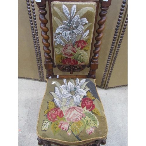 1247 - Victorian nursing chair with floral tapestry upholstered seat and back within a showwood frame raise... 