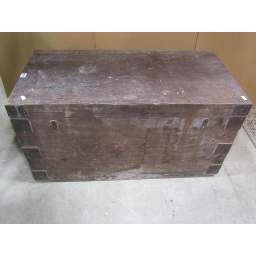 1071 - A heavy teak? or possibly pitch pine strongbox with hinged lid, twin lock and overlaid corner bracke... 