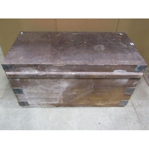 1071 - A heavy teak? or possibly pitch pine strongbox with hinged lid, twin lock and overlaid corner bracke... 