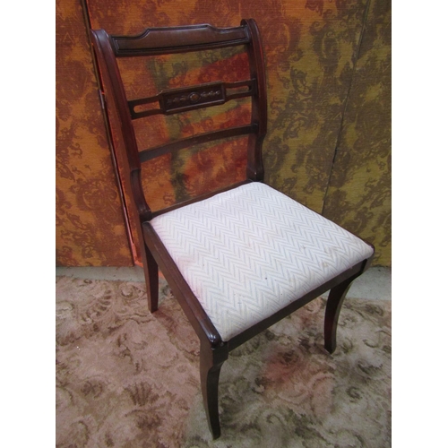 1252 - A set of six (4&2) reproduction Regency style bar back dining chairs with drop in upholstered seats ... 