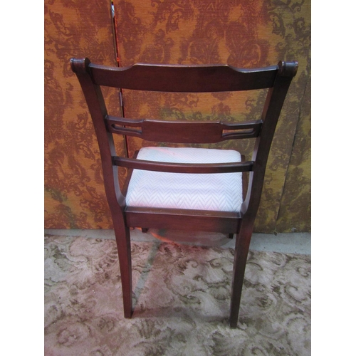 1252 - A set of six (4&2) reproduction Regency style bar back dining chairs with drop in upholstered seats ... 