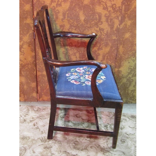 1255 - A Chippendale style open elbow chair with pierced splat and drop in floral tapestry seat together wi... 