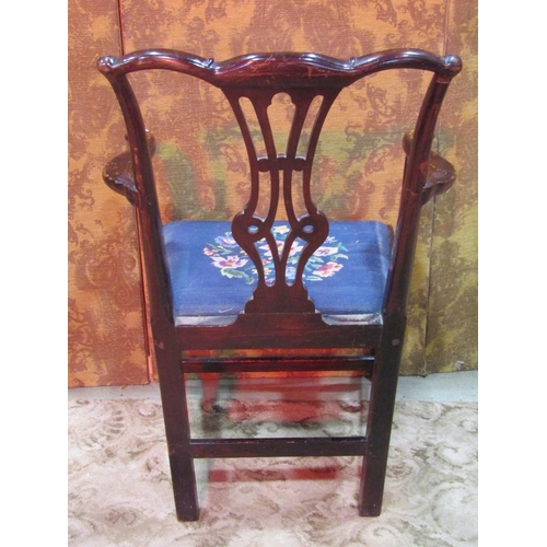 1255 - A Chippendale style open elbow chair with pierced splat and drop in floral tapestry seat together wi... 