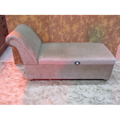 1279 - A vintage upholstered day bed and combined box ottoman with swept and rolled head rest