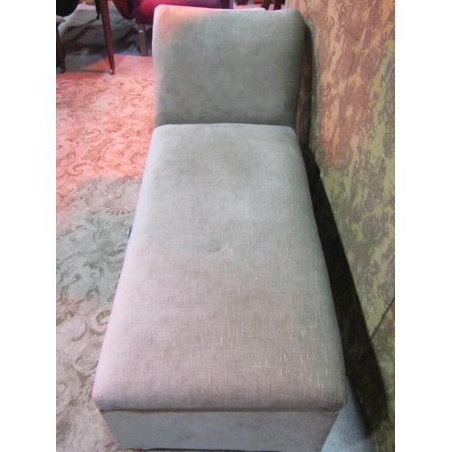 1279 - A vintage upholstered day bed and combined box ottoman with swept and rolled head rest