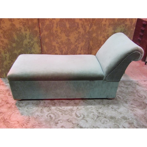 1279 - A vintage upholstered day bed and combined box ottoman with swept and rolled head rest