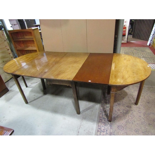 1309 - A Georgian mahogany D end sectional dining table raised on square cut and chamfered supports, 74 cm ... 