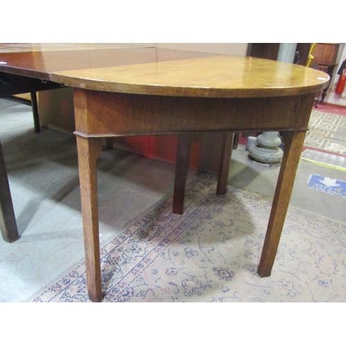 1309 - A Georgian mahogany D end sectional dining table raised on square cut and chamfered supports, 74 cm ... 