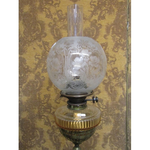 1310 - A late Victorian telescopic oil lamp standard with good quality scrolled wrought iron base beneath a... 