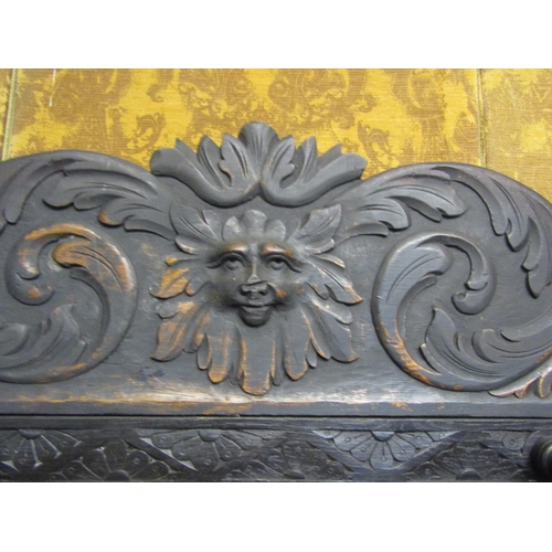 1313 - A Victorian gothic carved oak hallstand with carved lions mask, green man and scrolling acanthus det... 