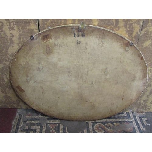 1319 - A 19th century gilded wall mirror with reeded and ribbon garland frame with original bevelled edge m... 