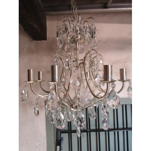 1056 - A pair of contemporary coated light steel eight branch hanging ceiling lights with faceted tear drop... 