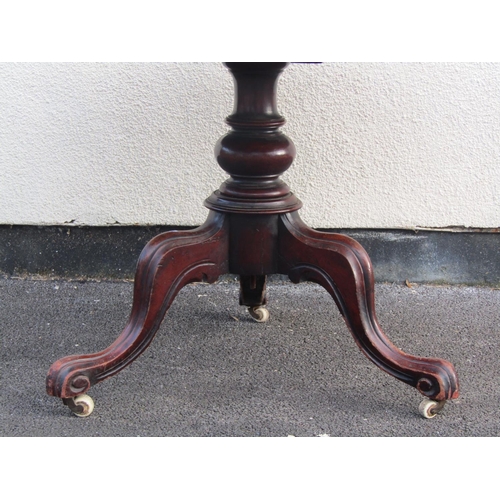 1369 - Victorian mahogany breakfast table with circular top on a turned pillar and carved tripod base, 105c... 