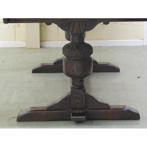 1398 - Old English style oak draw leaf refectory table raised on a pair of carved baluster supports united ... 