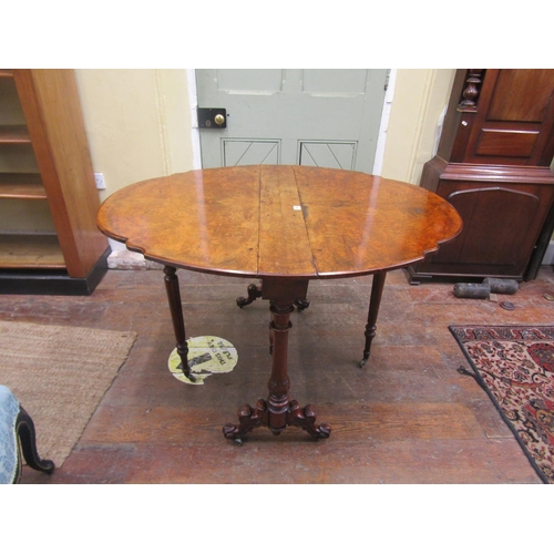 1512 - A Victorian walnut and burr walnut Sutherland tea table with gateleg action and carved detail, 74cm ... 