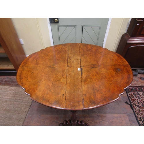 1512 - A Victorian walnut and burr walnut Sutherland tea table with gateleg action and carved detail, 74cm ... 