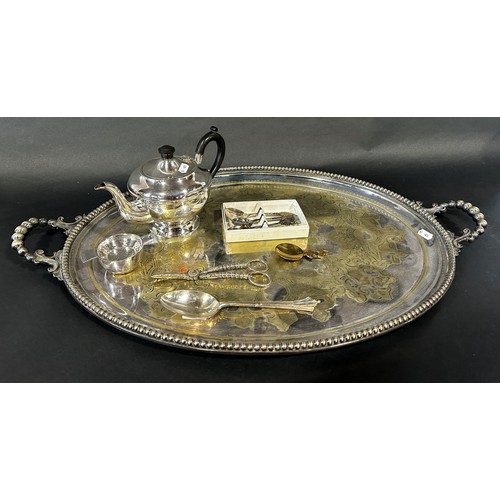 200 - A large Victorian silver plated two handled tray, 74cm x 47cm, a silver plated wine cooler, a teapot... 