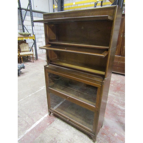 1403 - Four section Angus bookcase with glazed up and over door