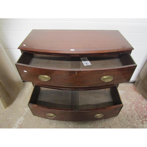 1414 - 19th century mahogany bow fronted chest of three long drawers, on swept supports with brass plate ha... 