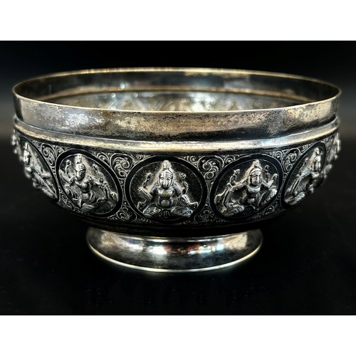 305 - An Indian silver metal bowl, with squatting deities to the bowl, Tarachuno Parshad Jeweller Bombay S... 