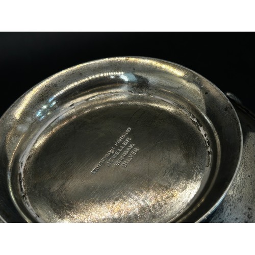 305 - An Indian silver metal bowl, with squatting deities to the bowl, Tarachuno Parshad Jeweller Bombay S... 