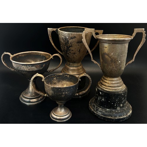 286 - Eight silver miniature trophies and a cut glass spirit barrel raised on a silver plated stand, 15-16... 