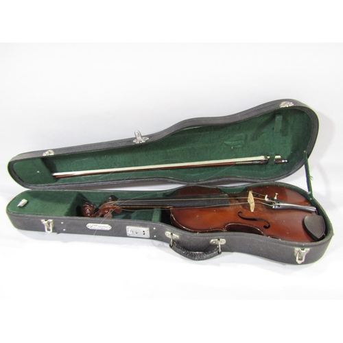 644B - A Stradivarius type violin lacks chin rest, possibly made in China, with an un-marked bow, with case... 