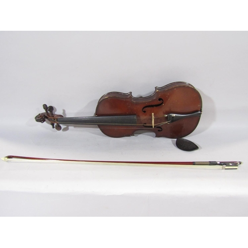 644B - A Stradivarius type violin lacks chin rest, possibly made in China, with an un-marked bow, with case... 