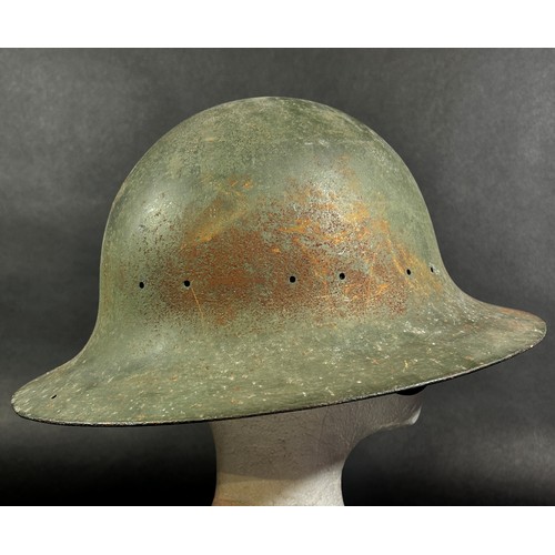 639 - WWII period military interest. A Zuckerman type steel helmet stamped M, lacks liner